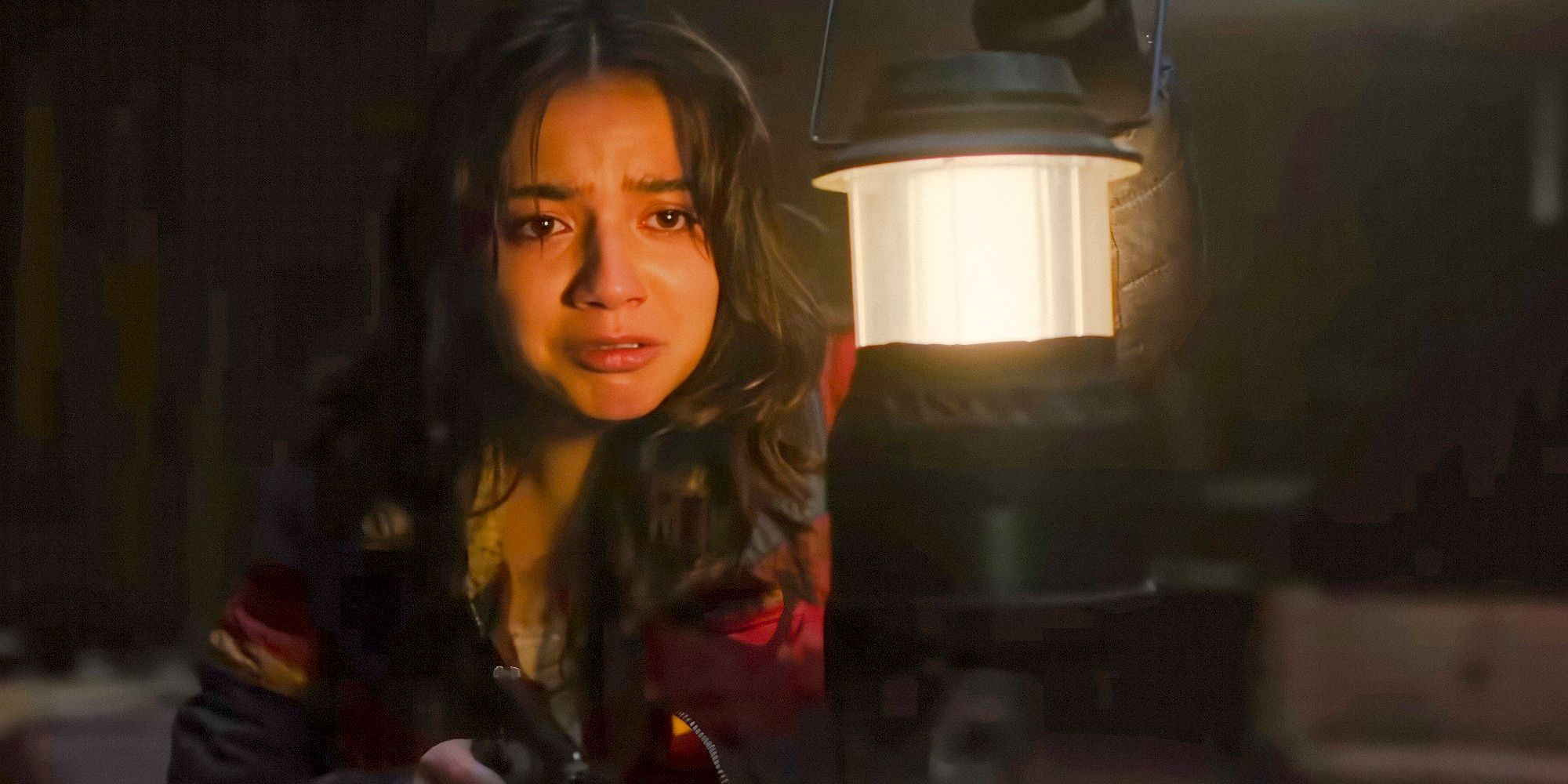 Dina (Isabela Merced) holding a flashlight in The Last of Us Season 2 