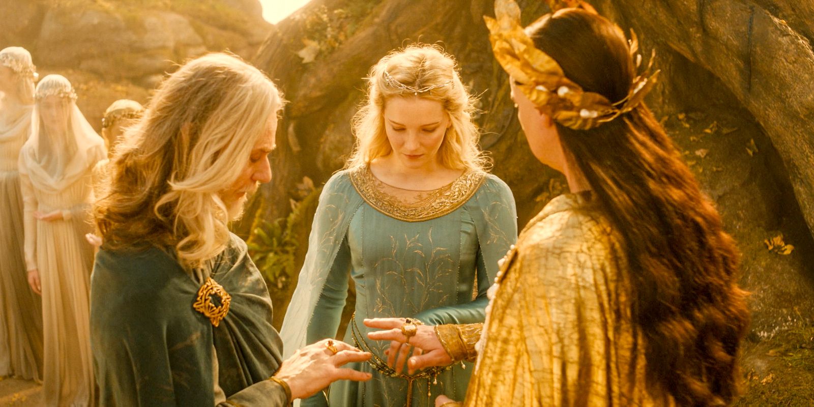 Círdan (Ben Daniels), Galadriel (Morfydd Clark), and High King Gil-galad (Benjamin Walker) wielding the Rings of Power in The Lord of the Rings: The Rings of Power Season 2 Episode 1