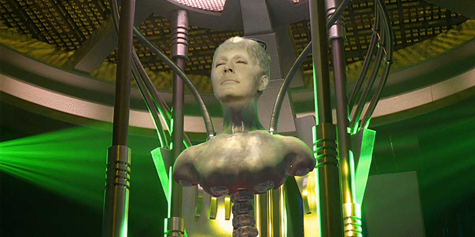 The torso of the Borg Queen (Susanna Thompson) hangs from cables in the ceiling in Star Trek Voyager Dark Frontier