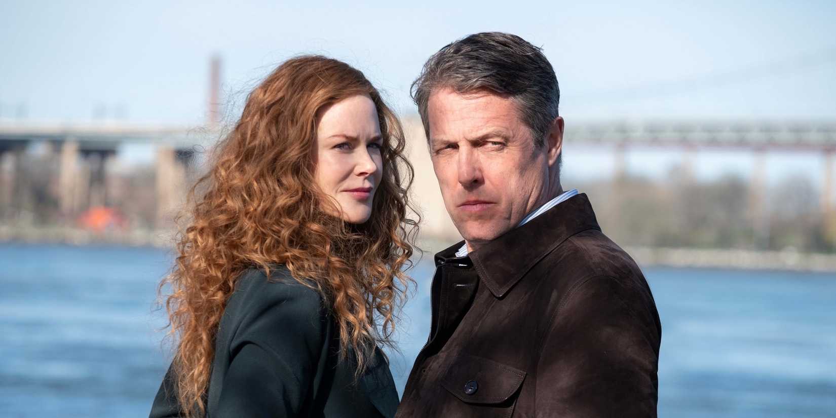 Hugh Grant and Nicole Kidman standing by the water in The Undoing