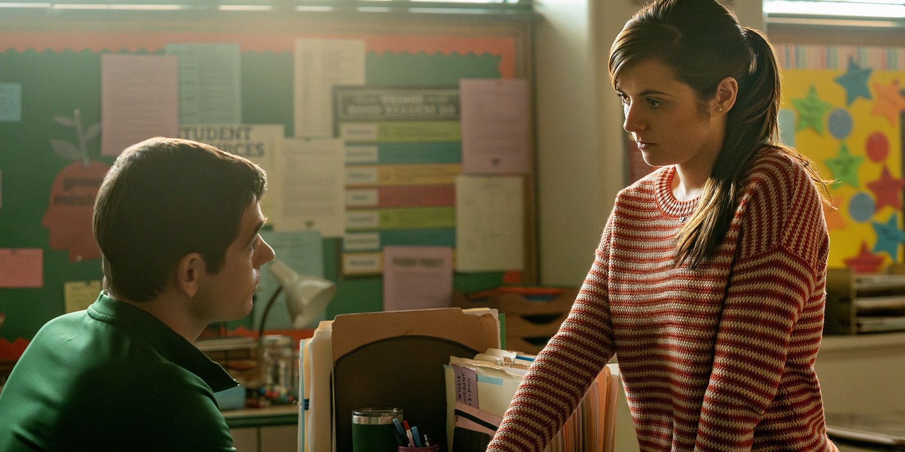 Maggie (Gabrielle Creevy) talking to Aaron (Jason Knodel) in a classroom in Three Women.