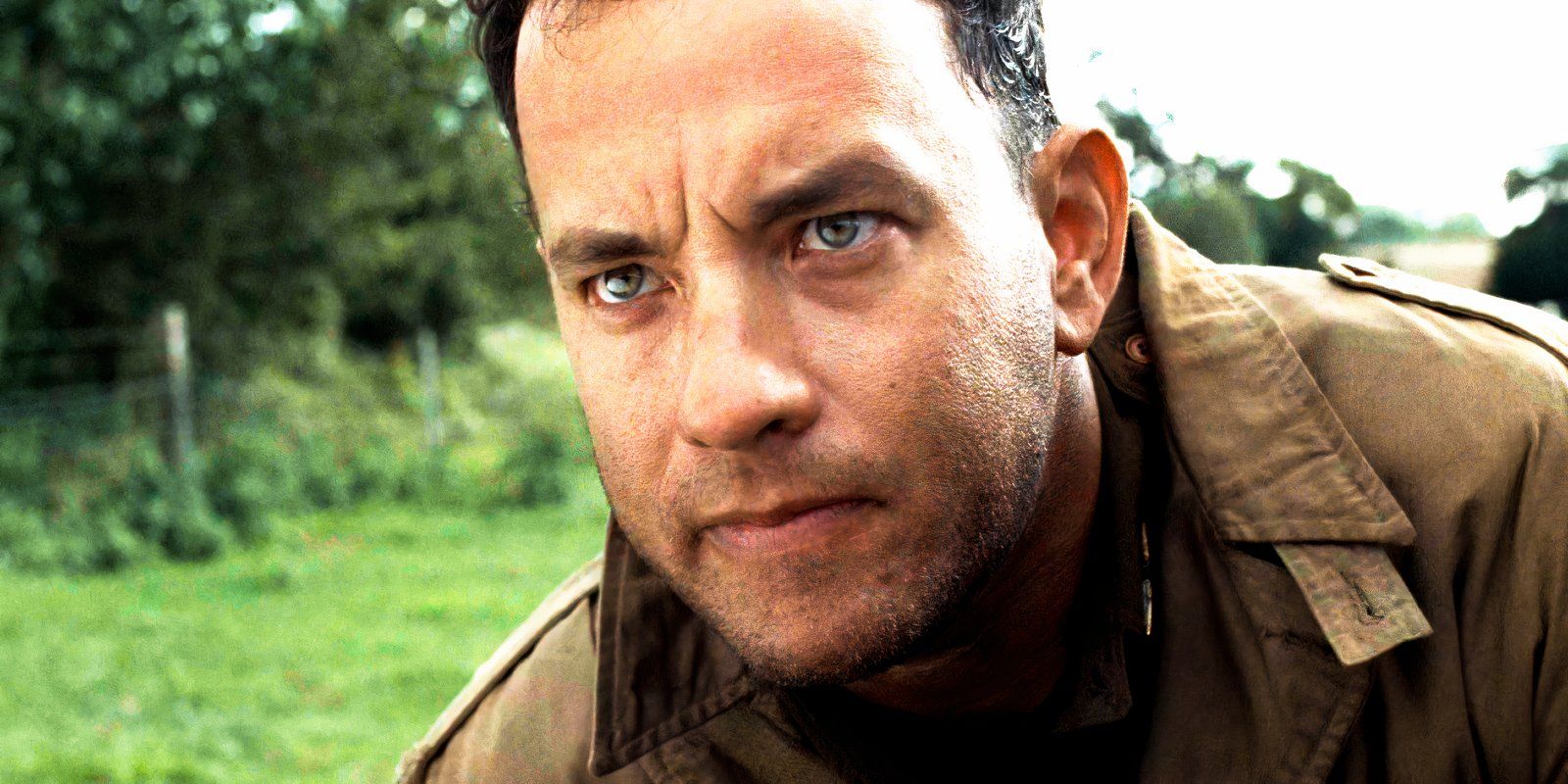 Tom Hanks looking serious as Captain Miller in Saving Private Ryan