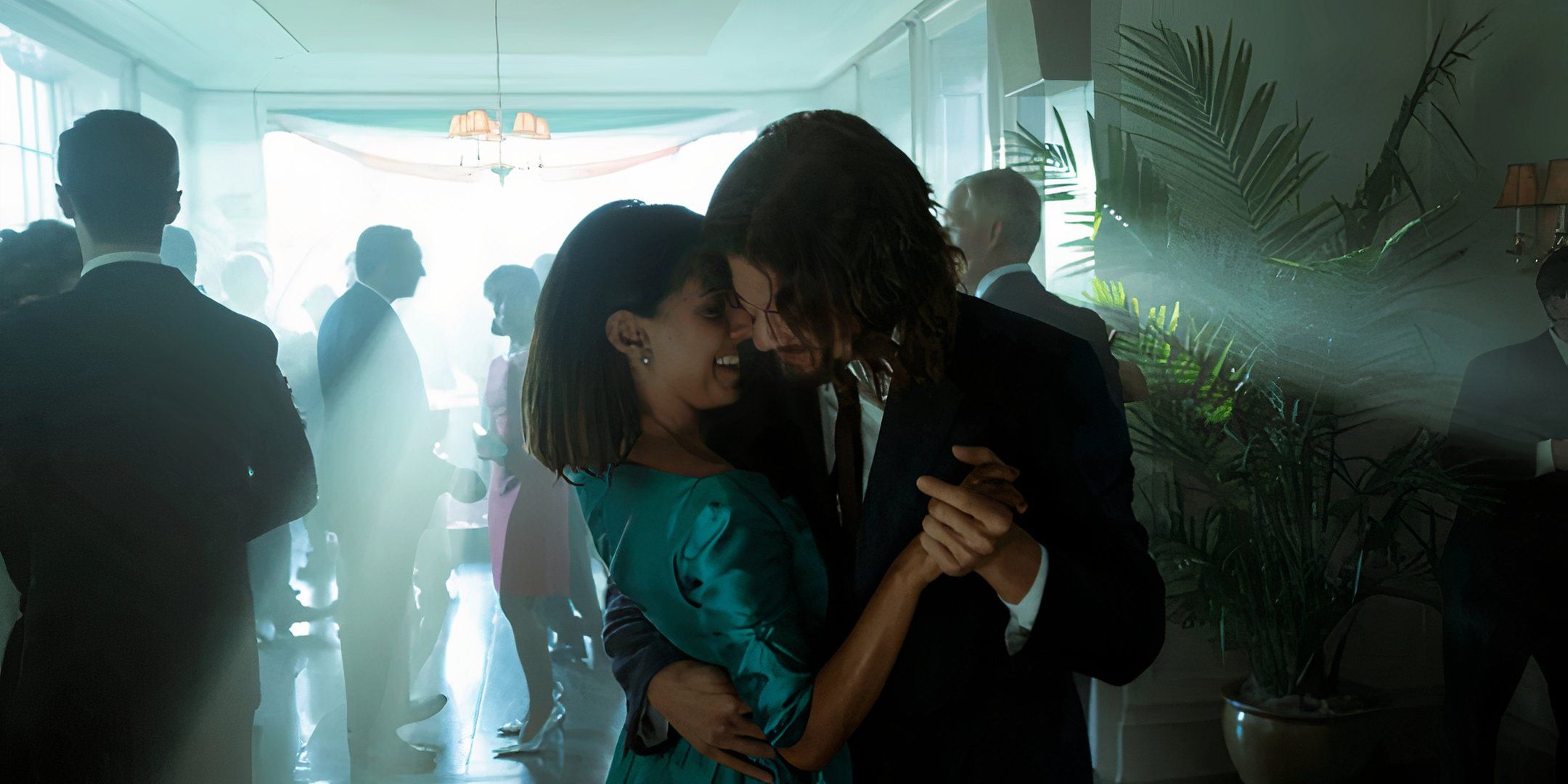 Lila (Ritu Arya) wears a blue gown to dance with Diego (David Castañeda) in The Umbrella Academy.