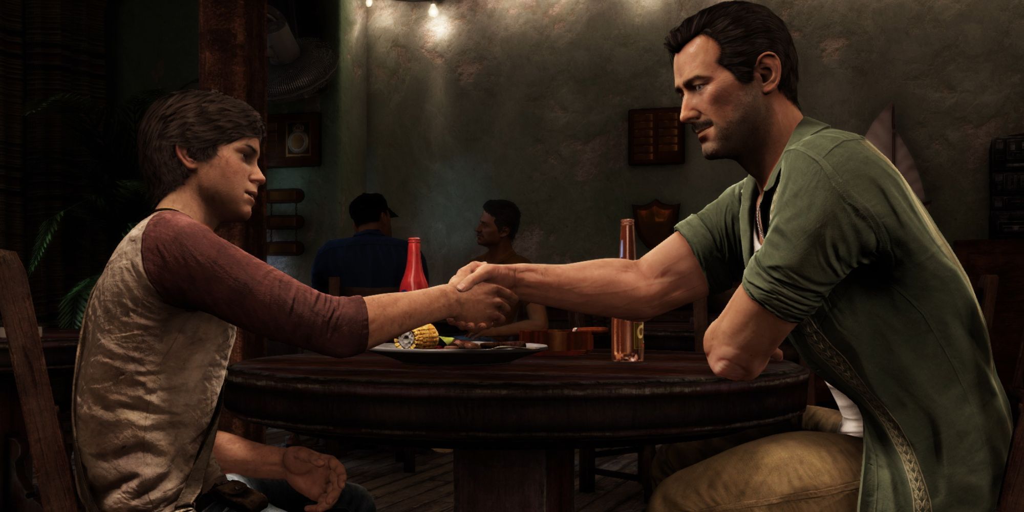 Nathan Drake and Victor Sullivan shaking hands in Uncharted 4