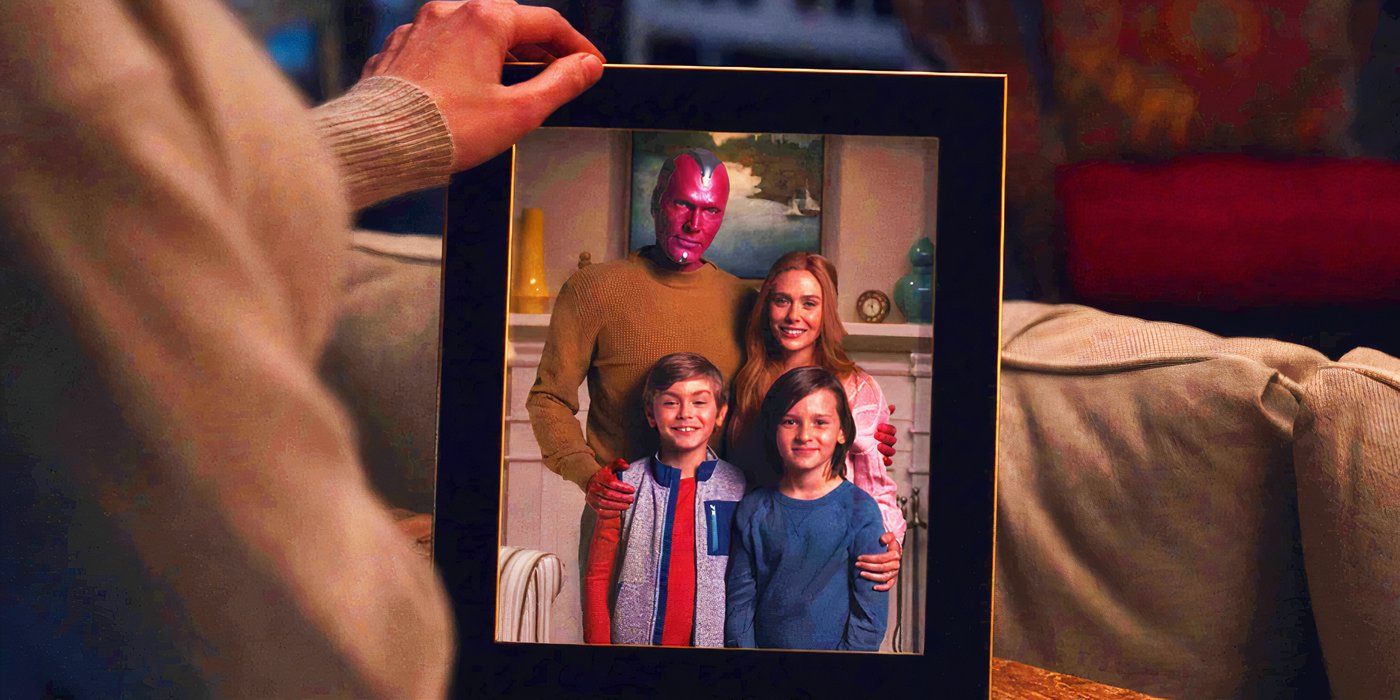 Wanda Maximoff looking at a photo of her family in WandaVision