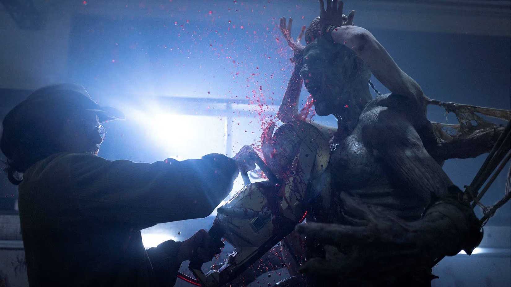 Someone chopping up a zombie in We Are Zombies (2024)
