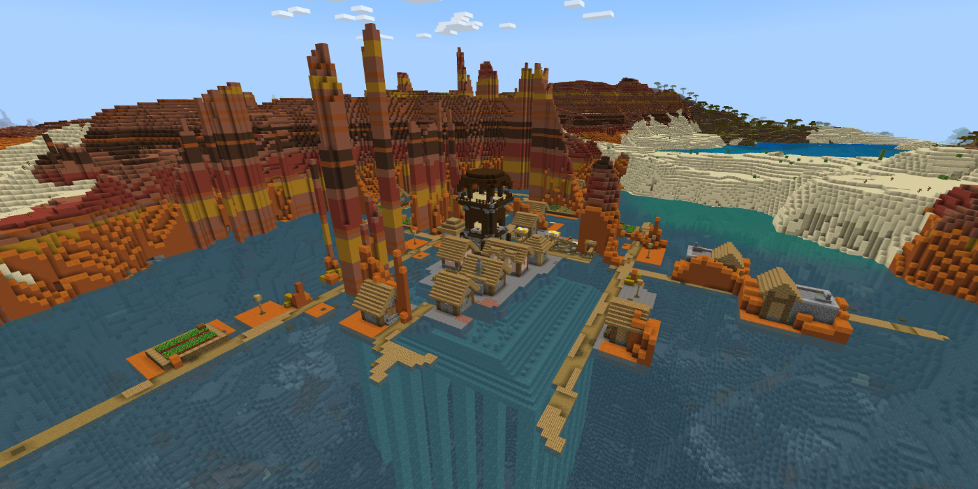 View of a village and pillager outpost in a Badland biome lagoon, with an Ocean Monument underneath in the Wild West PE Seed in Minecraft.