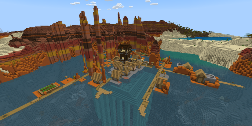 View of a village and pillager outpost in a Badland biome lagoon, with an Ocean Monument underneath in the Wild West PE Seed in Minecraft.