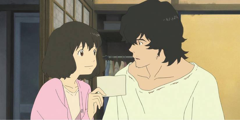 Hana showing Wolf Man a paper while they sit next to each other 