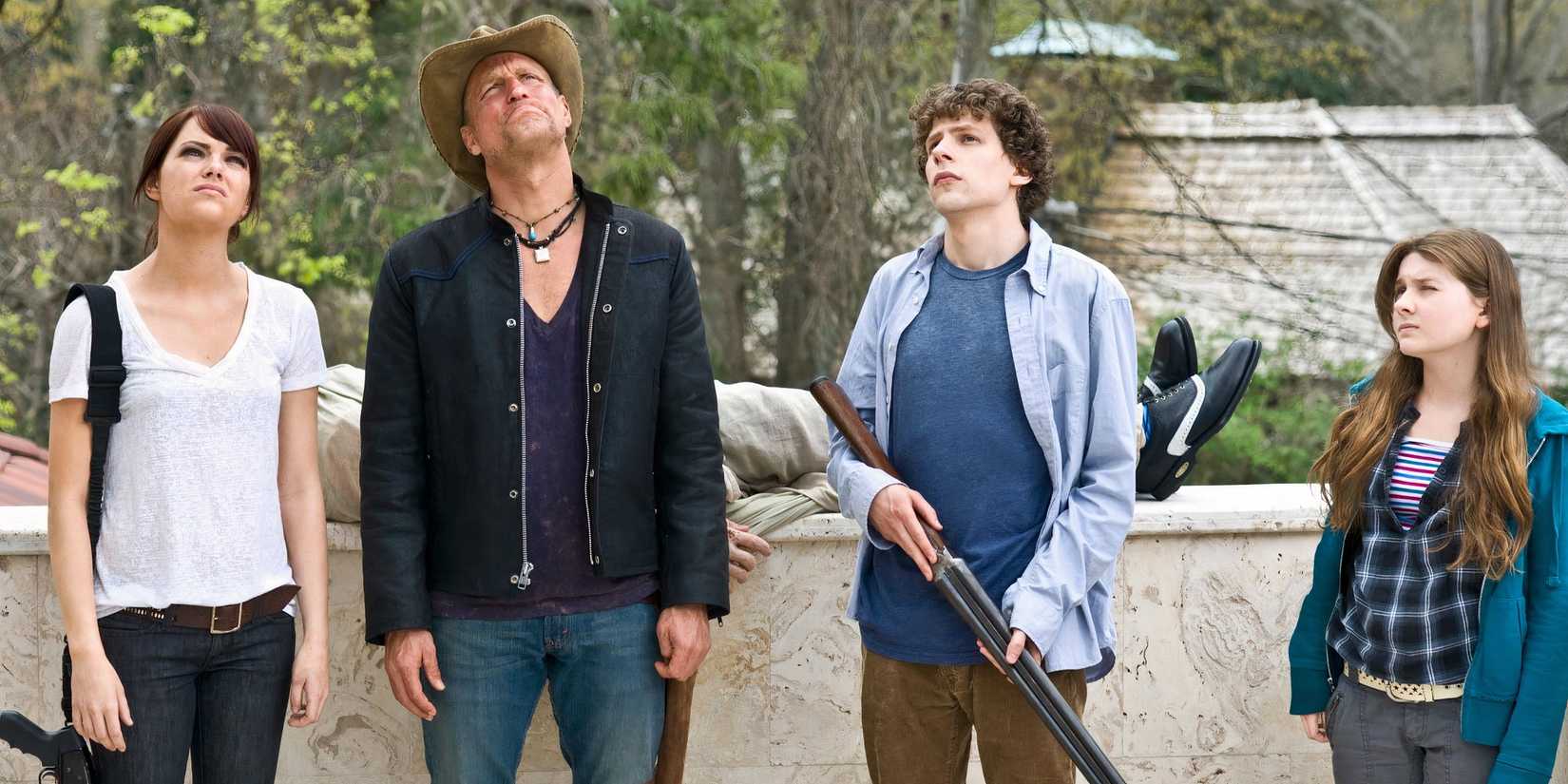 The cast of Zombieland all look upwards.