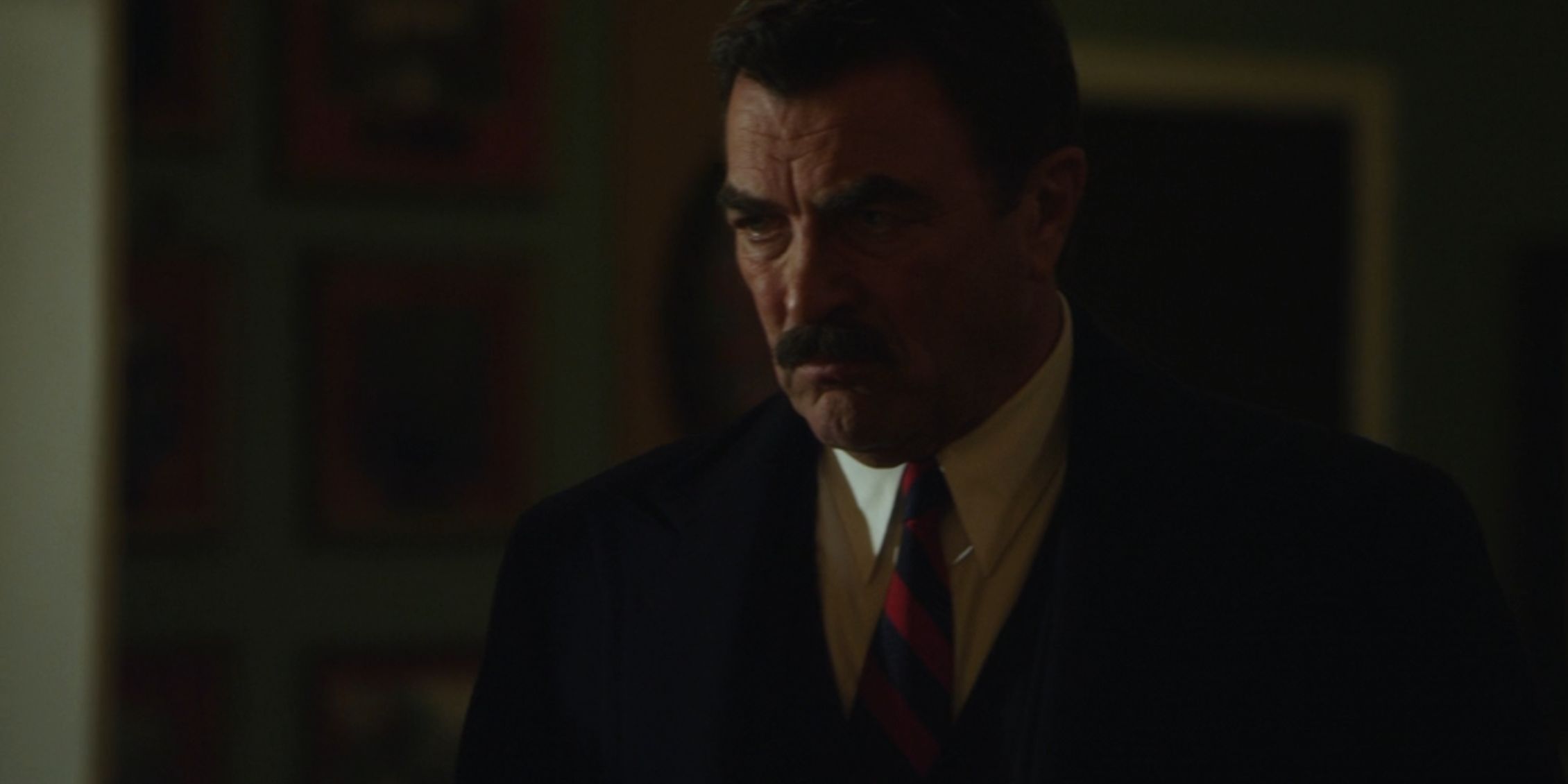 Blue Bloods Frank standing alone looking angry