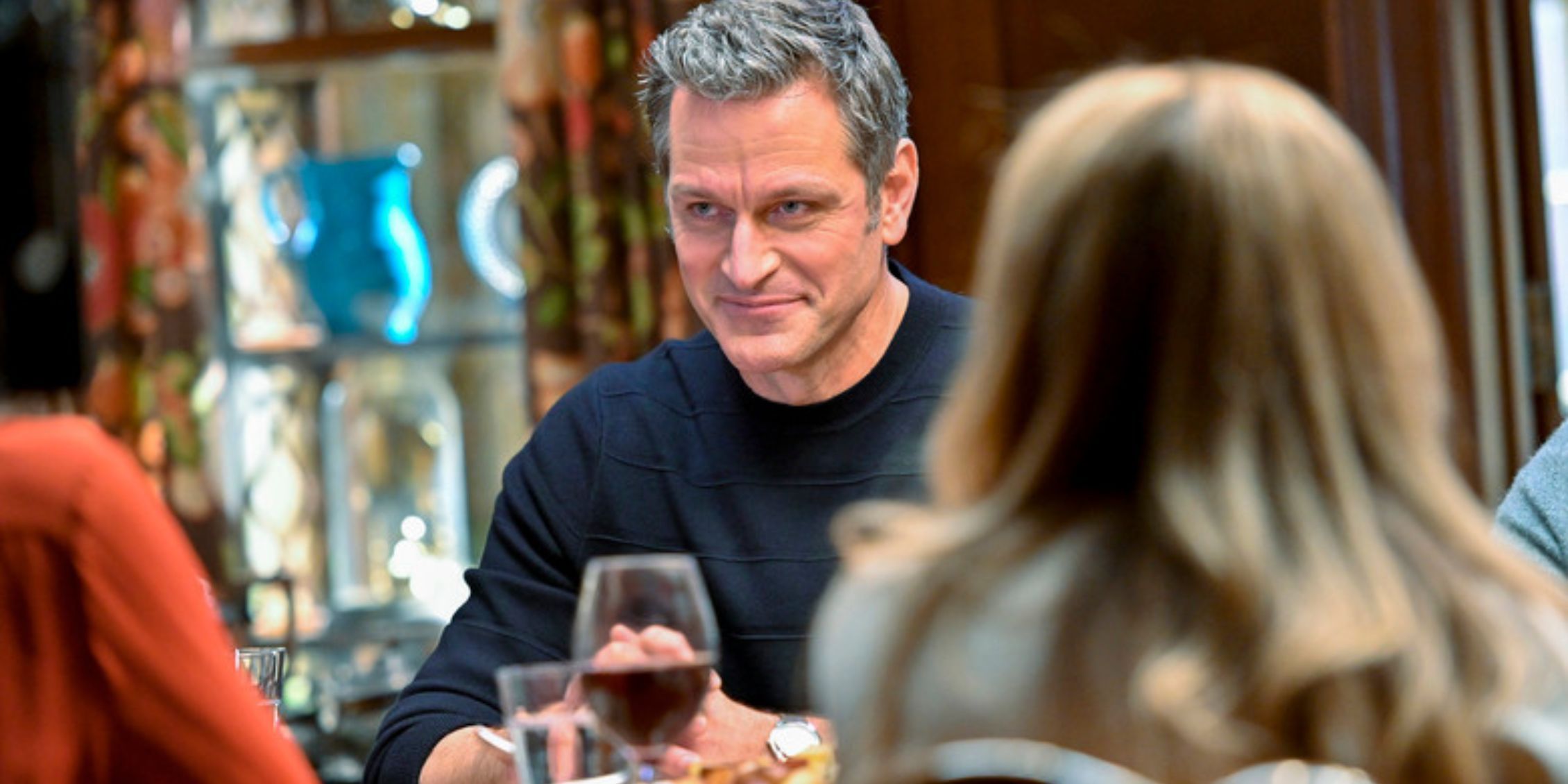 Blue Bloods Jack Boyle at the Sunday dinner table with a glass of red wine in front of him