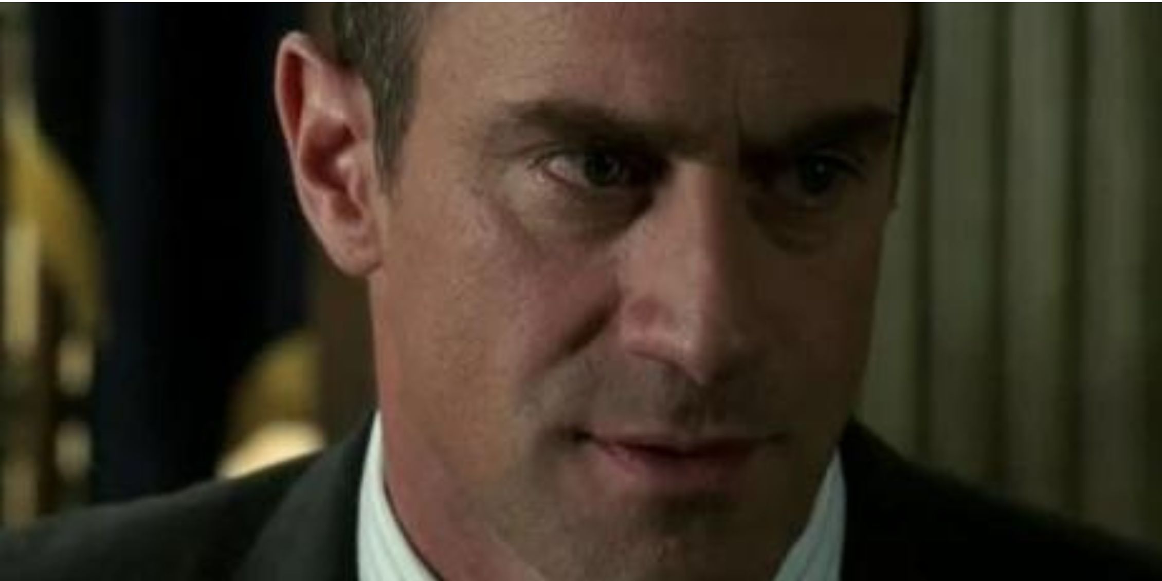 Law & Order: SVU Stabler standing and staring blankly, unable to see