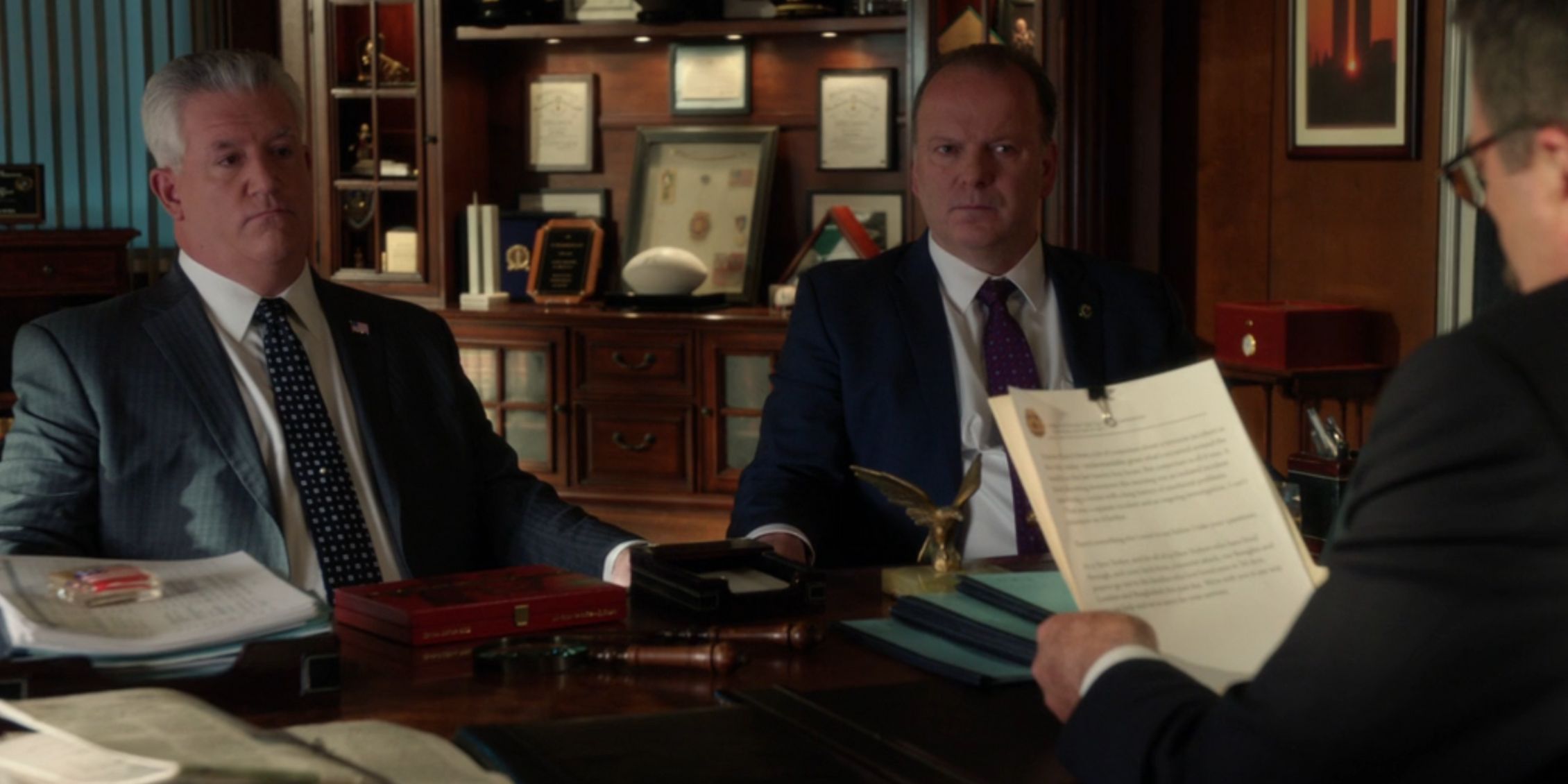 Blue Bloods Sid and Garrett looking at the same report as Frank