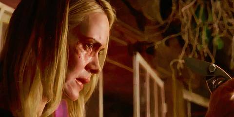 Cordelia Goode (played by Sarah Paulson) with garden shears in American Horror Story: Coven 