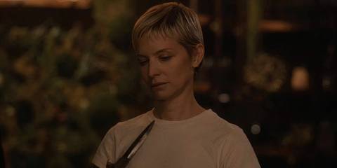 Adeline Harding (played by Annabelle Dexter-Jones) looking down at a knife in American Horror Story: Delicate 