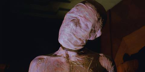 The Addiction Demon (played by Alexander Ward) looking on in American Horror Story: Hotel