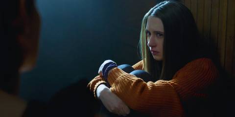 Violet Harmon (played by Taissa Farmiga) sitting down looking worried in American Horror Story: Murder House