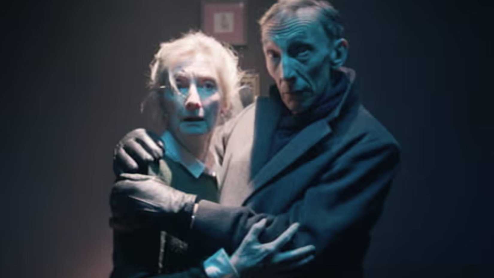 Anything for Jackson image of two characters holding one another