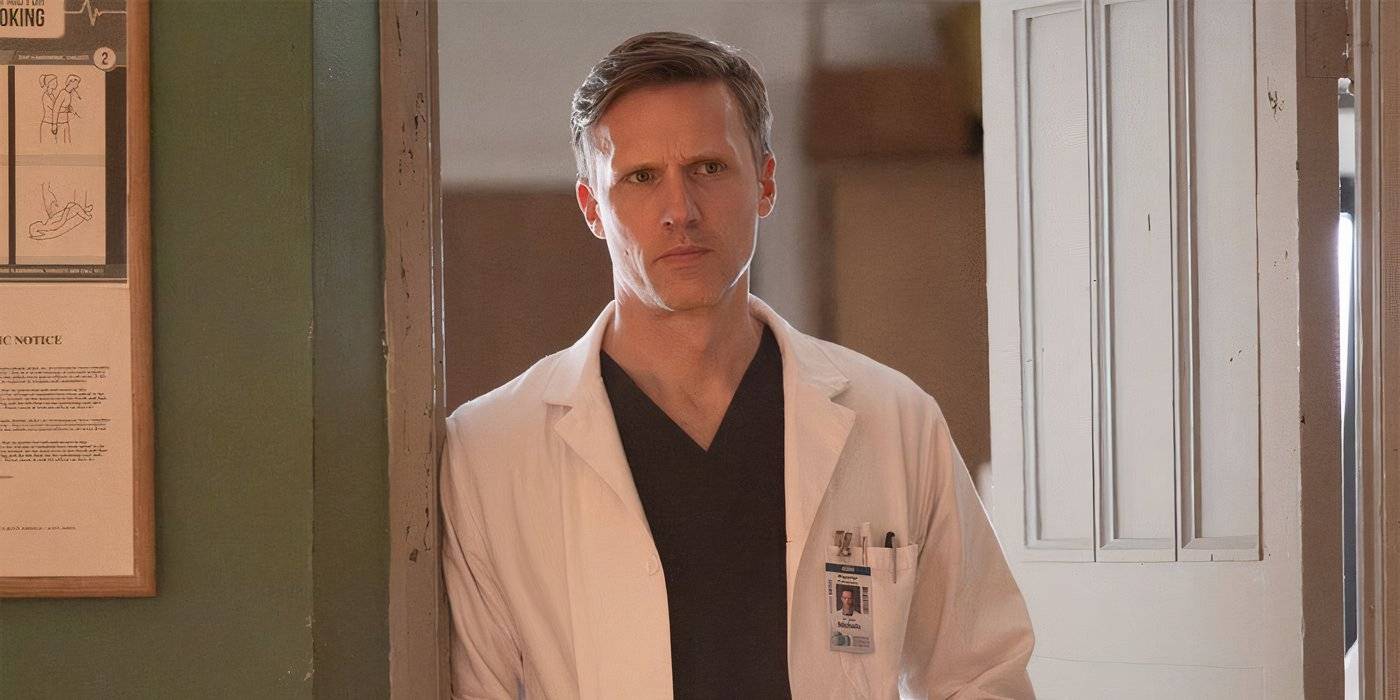 Teddy Sears leans against a doorframe looking angry in Brilliant Minds