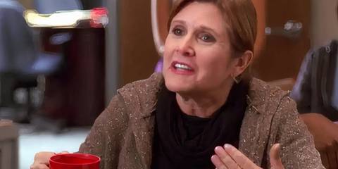 Carrie Fisher In The TGS Writers room explaining something exasperatedly 