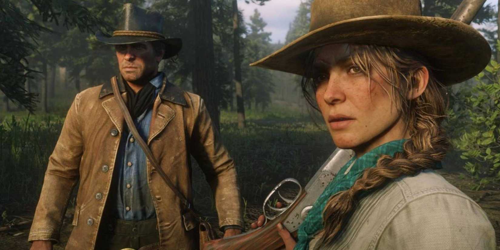 Arthur and a woman standing in a field of grass.