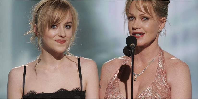 Dakota Johnson and Melanie Griffith at the microphone onstage at the televised Golden Globes ceremony