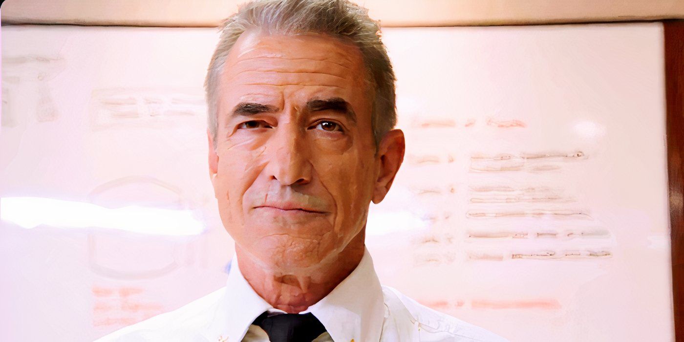 Dermot Mulroney as Dom Pascal standing in front of a white board in Chicago Fire