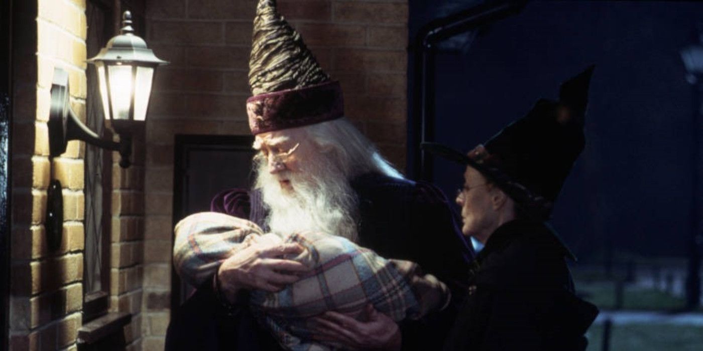 Dumbledore holding baby Harry next to McGonagall in Harry Potter & the Sorcerer's Stone