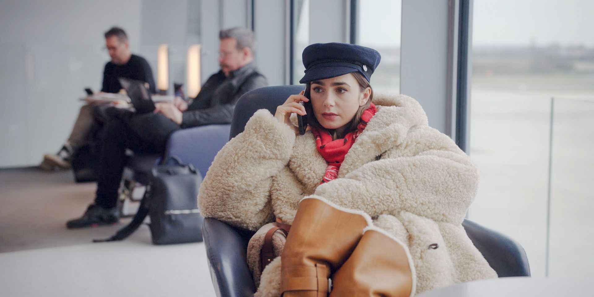 Emily (Lily Collins) at the airport informs Gabriel that her flight to Chicago was canceled in Emily in Paris Season 4 Episode 6