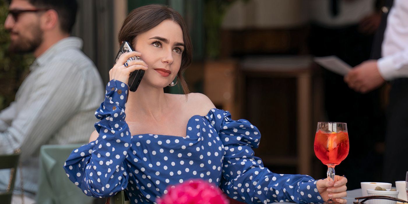 Emily (Lily Collins) enjoys an aperol spritz in Rome in Emily in Paris season 4, part 2