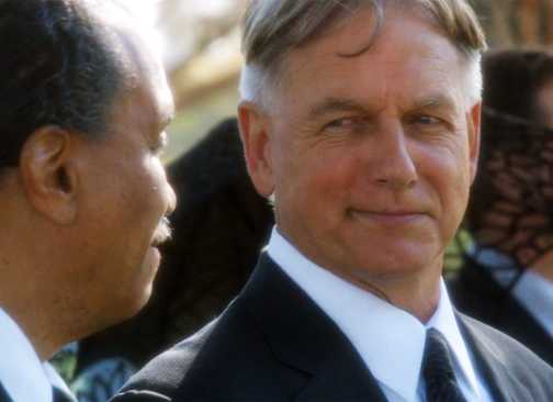 Gibbs smiling at a funeral in NCIS