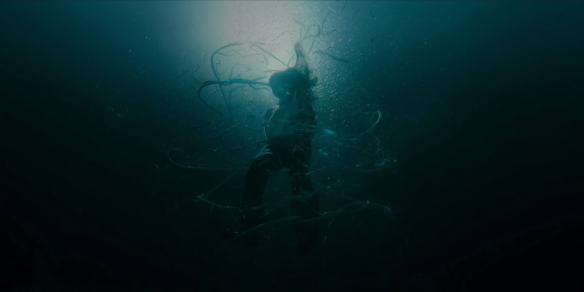 Tendrils around Yoon Chae-ok break underwater in Gyeongseong Creature 2