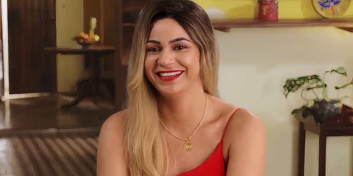 Ingrid in 90 Day Fiance in red dress smiling