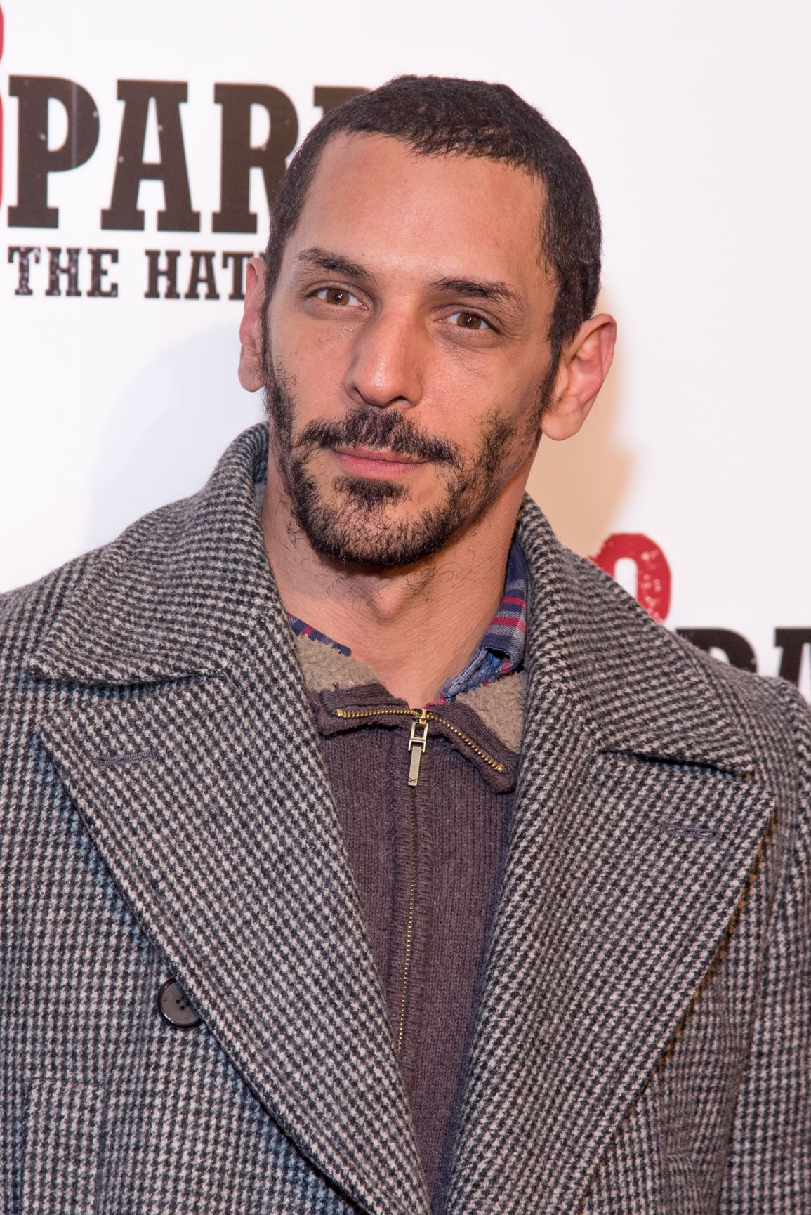 Headshot of Tomer Sisley