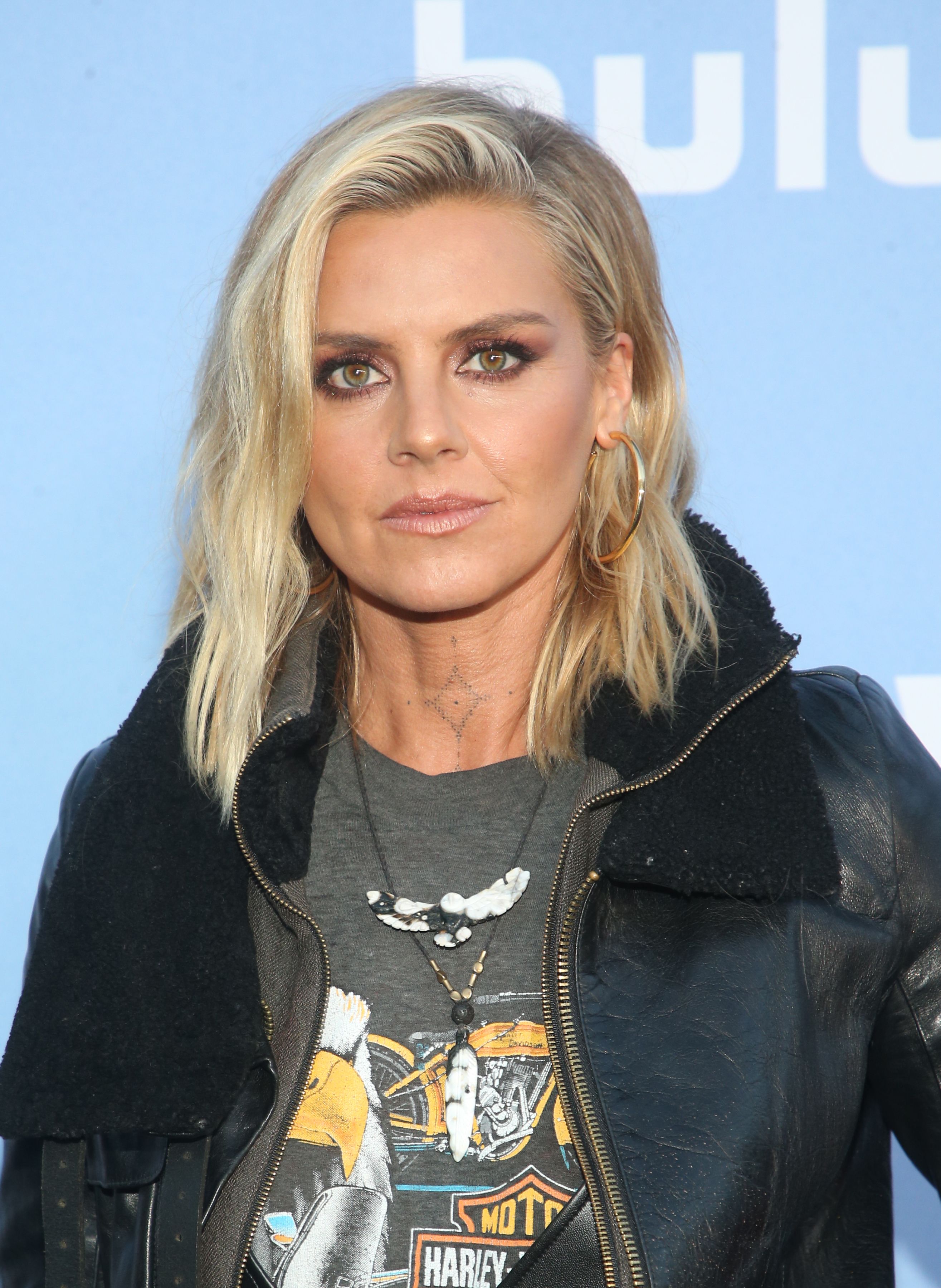 Headshot Of Eliza Coupe