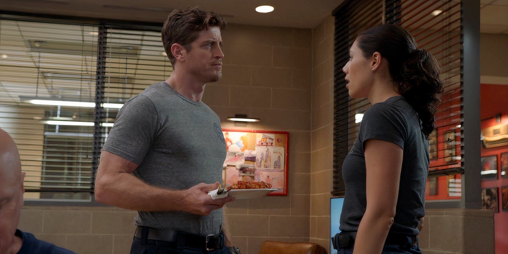 Jake Lockett as Sam Carver and Hanako Greensmith as Violet Mikami in Chicago Fire season 13