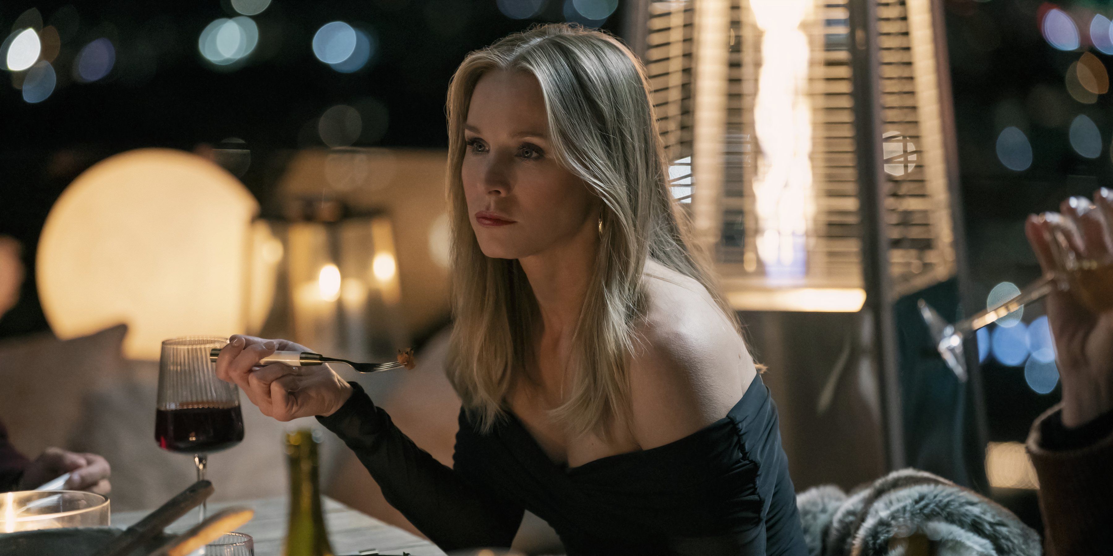 Joanne eats at a dinner table in Netflix's Nobody Wants This