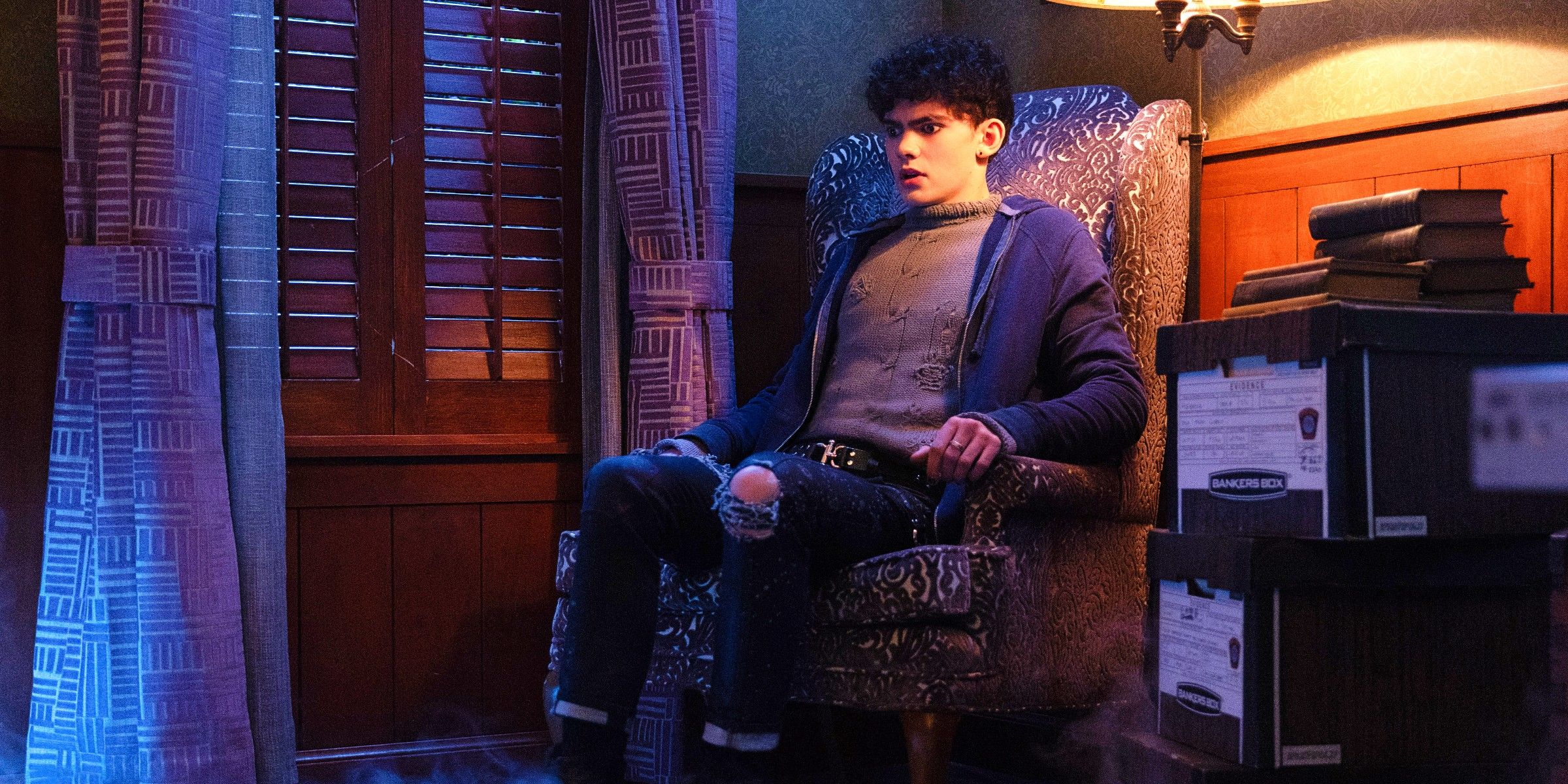 Joe Locke As Teen Sitting In An Armchair In Agatha's House With Fog Around His Feet In Agatha All Along