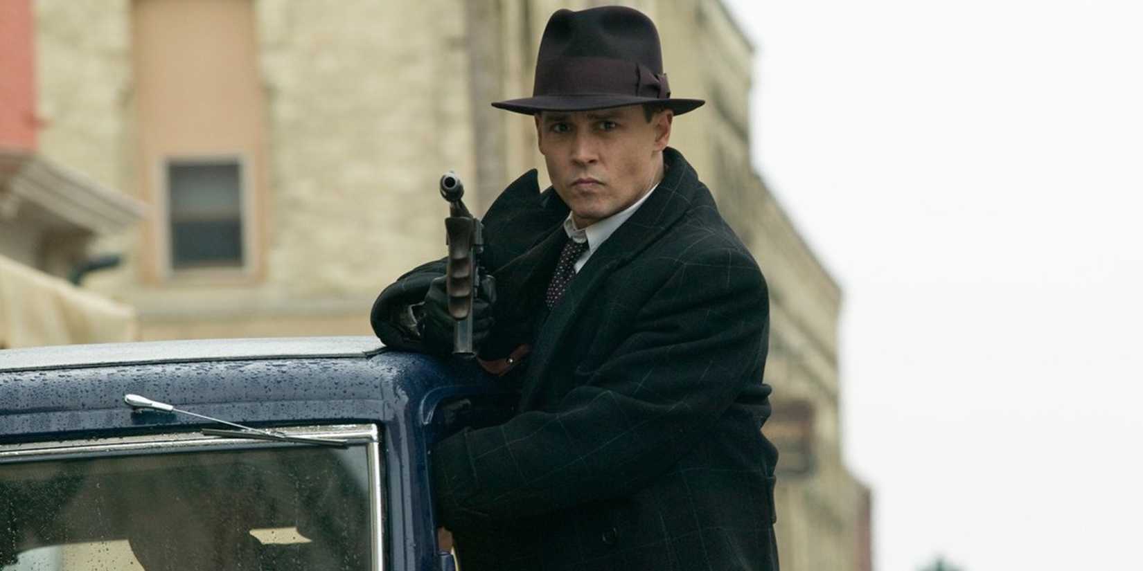 John Dillinger with a machine gun in Public Enemies