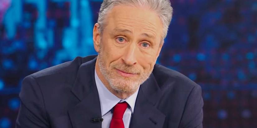 Jon Stewart looking at the camera with a wry look on his face for The Daily Show