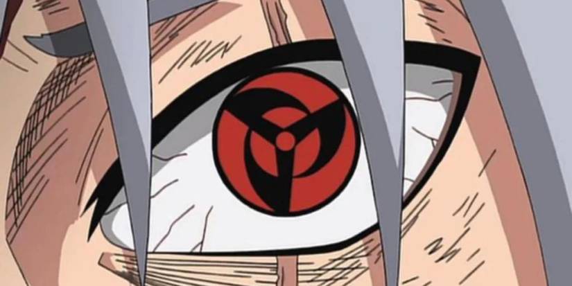 Kakashi wieldding the Mangekyo Sharingan.