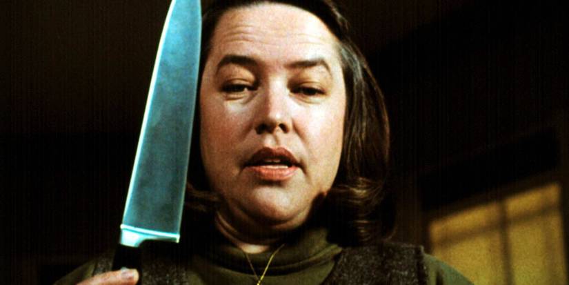 Kathy Bates as Annie Wilkes holding a knife in Misery