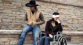 Kayce (Luke Grimes) and Monica (Kelsey Asbille) having a fight while Monica is in a wheelchair in Yellowstone. copy