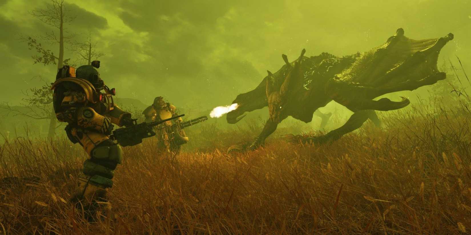 Two players in Power Armor shooting miniguns at a winged creature.