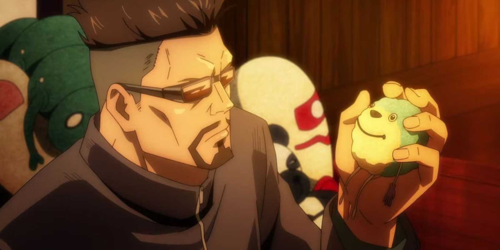 Masamichi Yaga com um cadáver amaldiçoado na mão