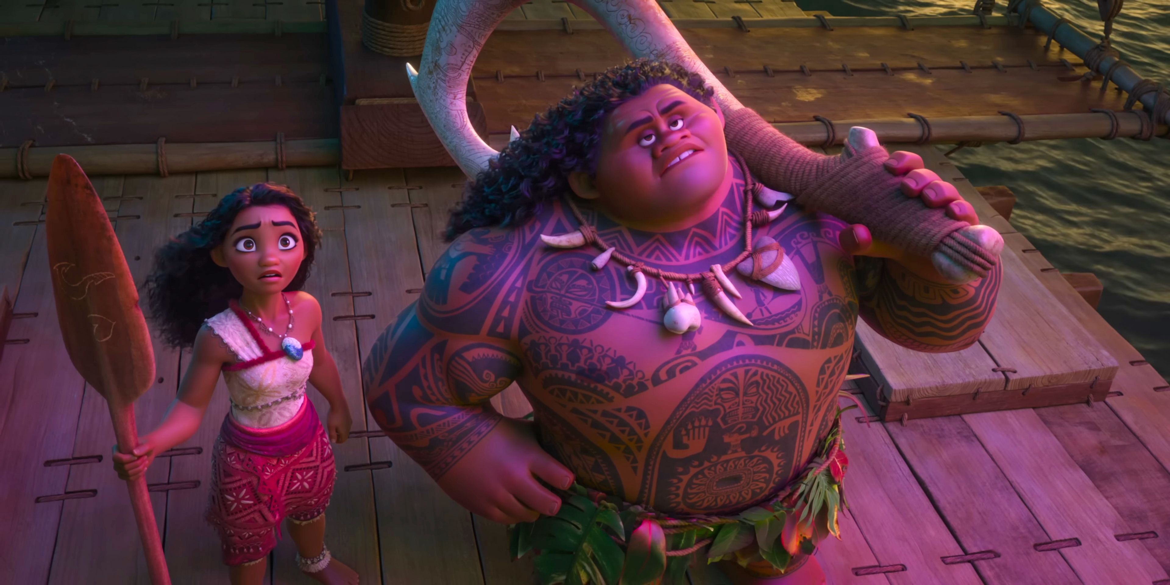 Moana and Maui gazing upwards, astonished at something in the sky in Moana 2