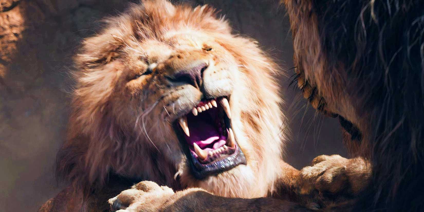 mufasa yelling in pain and hanging from a cliff in the lion king 2019