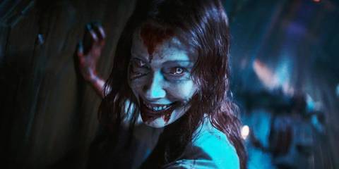Possessed Ellie smiling in Evil Dead Rise