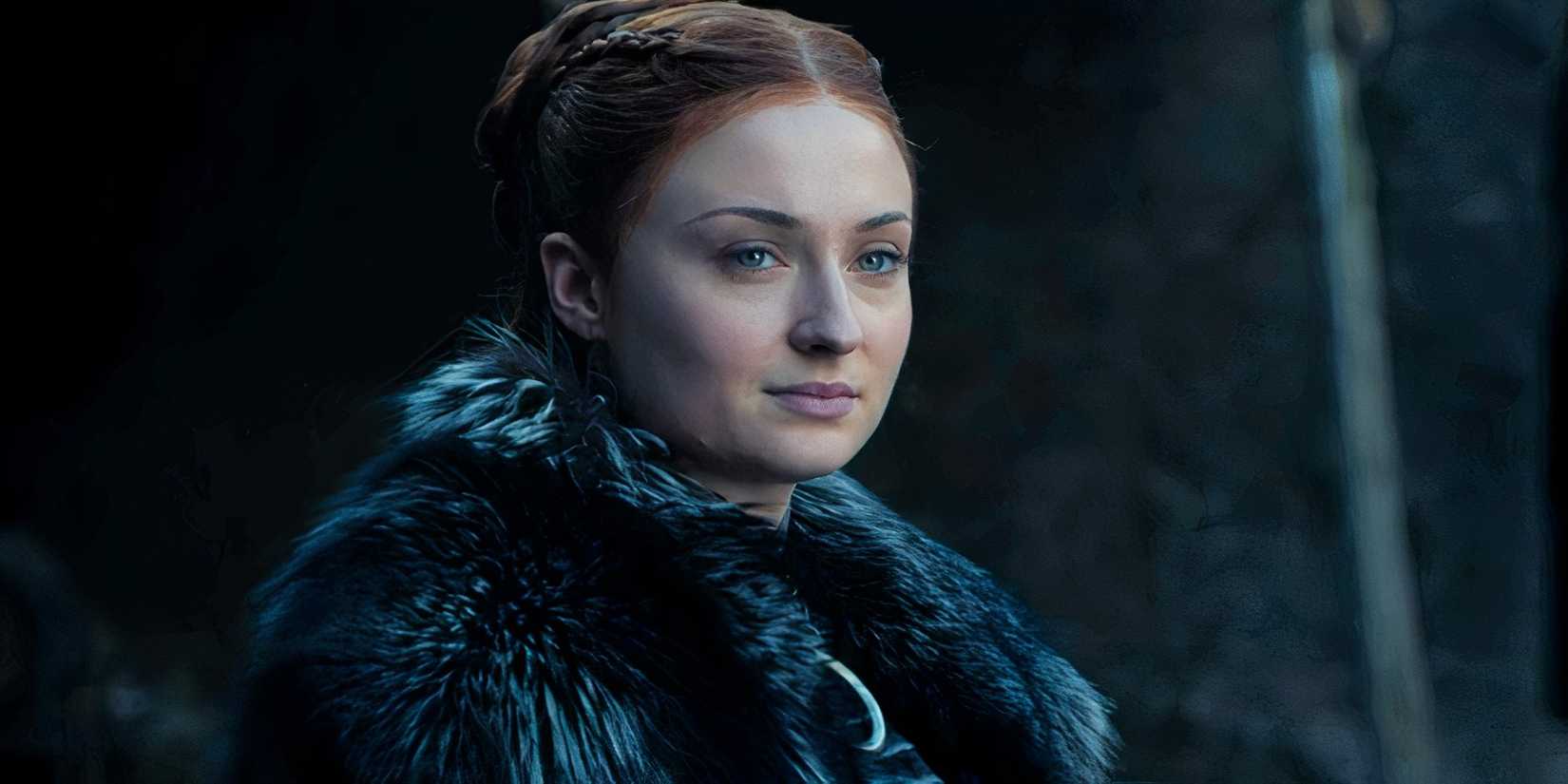 Sansa Stark (Sophie Turner) smiles as she looks at Jaime (Nikolaj Coster-Waldau) in Game of Thrones